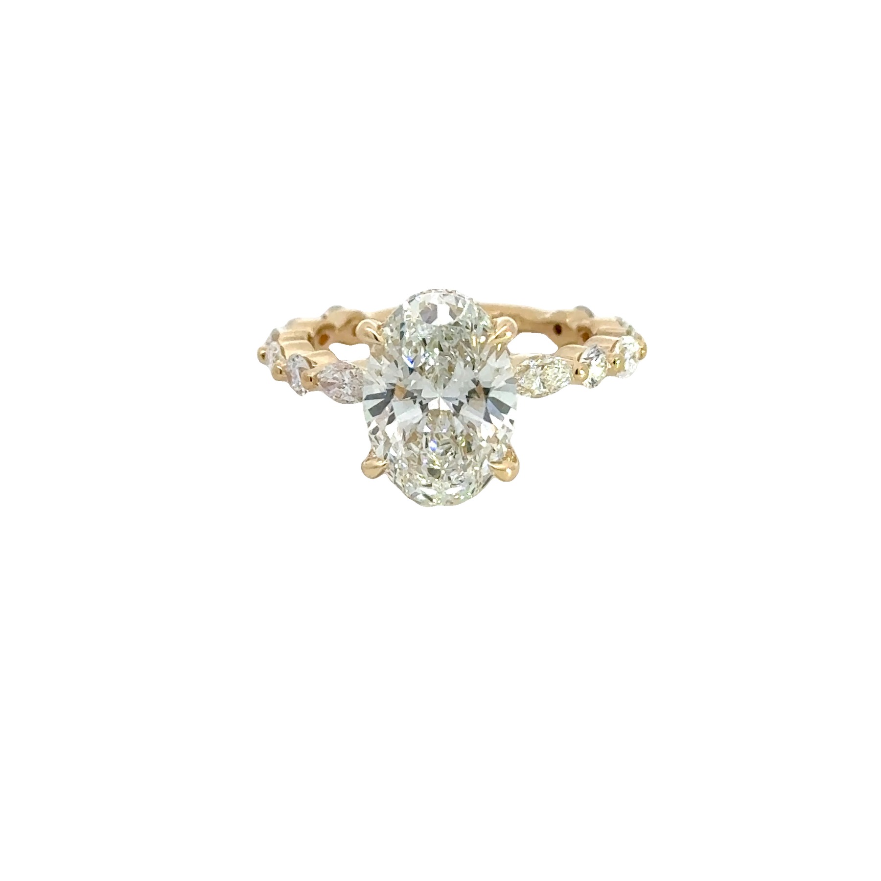 Oval centre, marquise and round accents