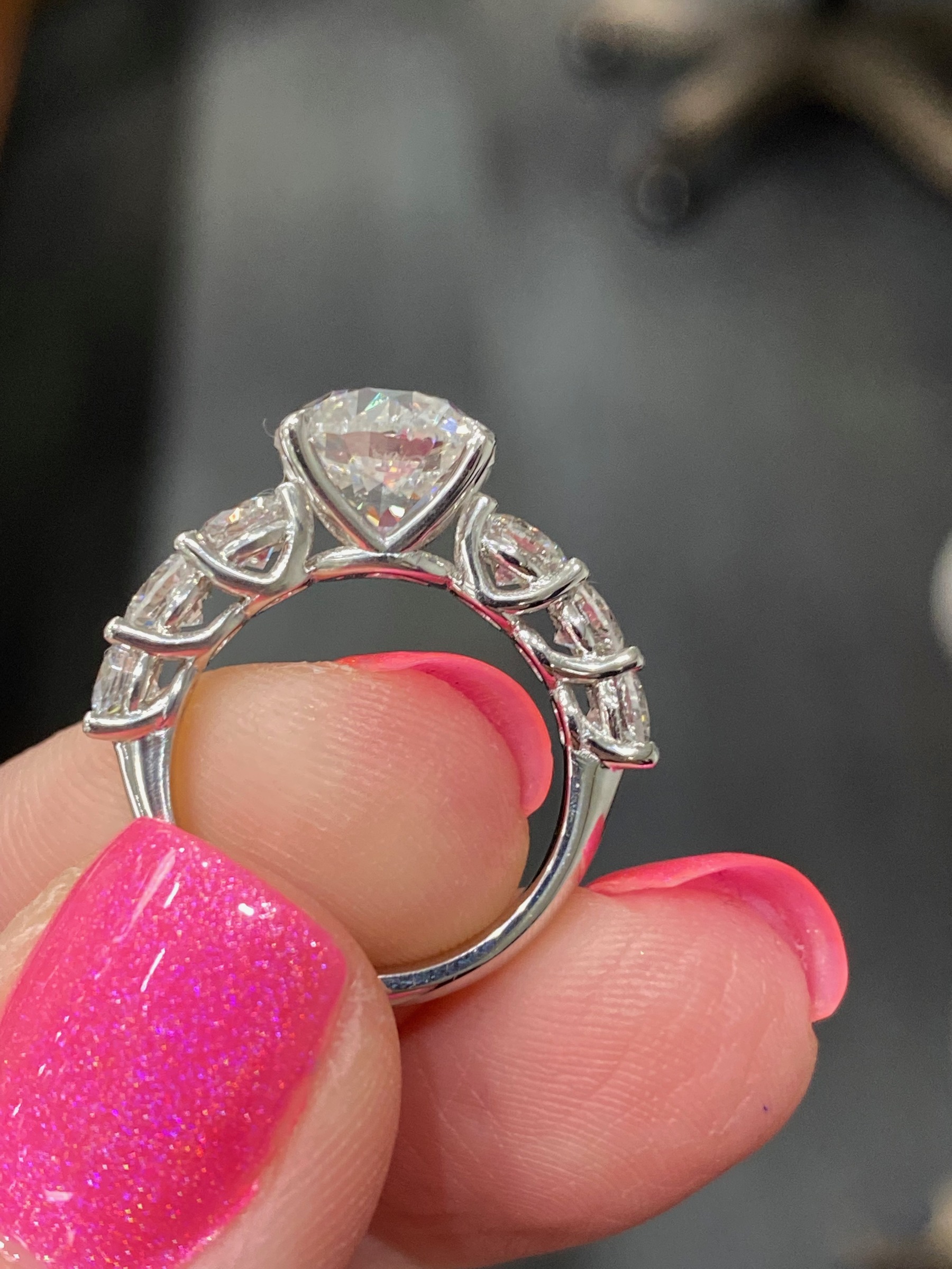 Round brilliant diamond ring, side view